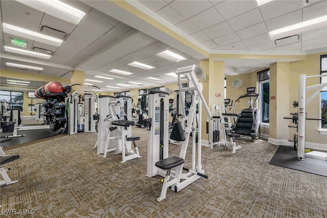 gym with carpet floors and baseboards