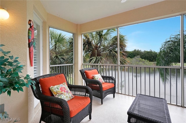 sunroom with a water view