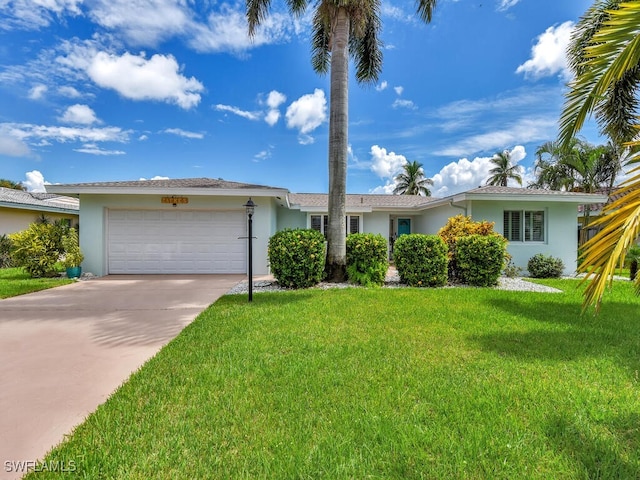 ranch-style house with a front lawn and a garage