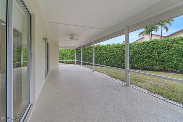 view of patio featuring ceiling fan