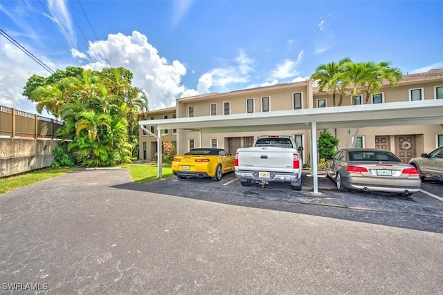 4803 SW Santa Barbara Ct Unit 2, Cape Coral, FL 33914 - covered parking lot with fence
