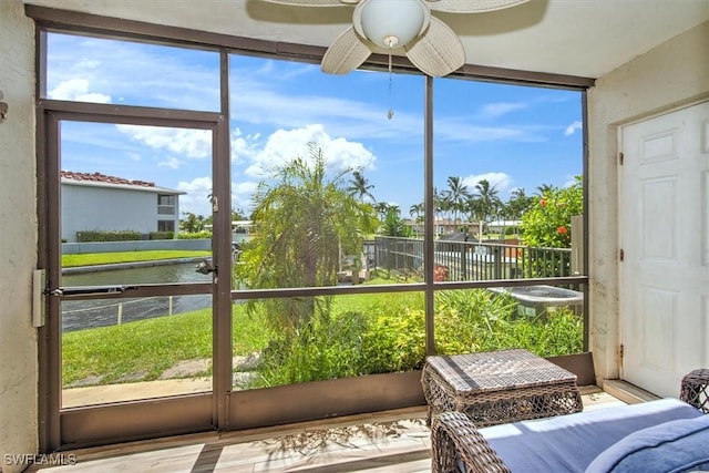 4803 SW Santa Barbara Ct Unit 2, Cape Coral, FL 33914 - sunroom / solarium with a ceiling fan and a water view