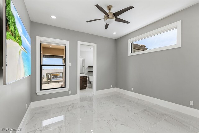 spare room featuring ceiling fan