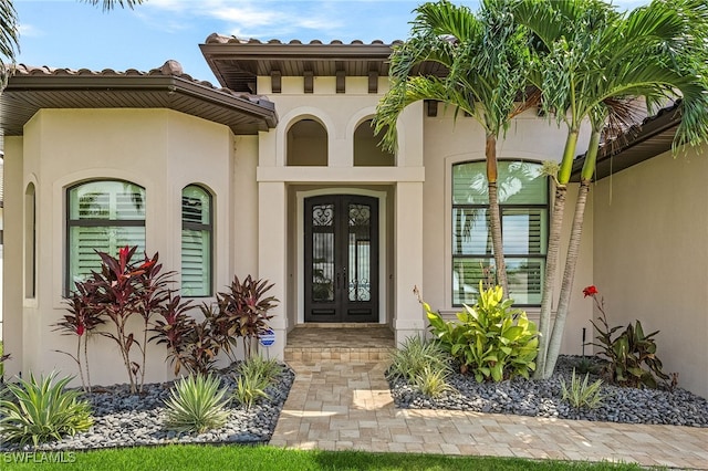 entrance to property featuring french doors