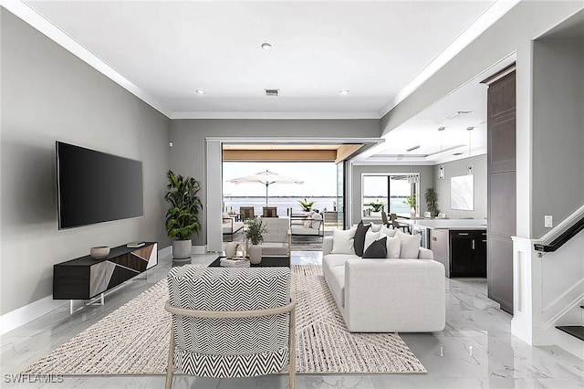 living area with marble finish floor, visible vents, baseboards, and crown molding