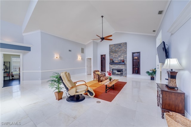 living area with high vaulted ceiling, ceiling fan, a fireplace, and crown molding