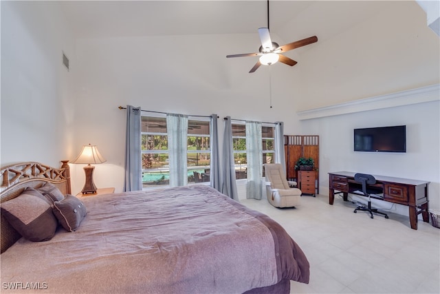 bedroom featuring high vaulted ceiling and ceiling fan