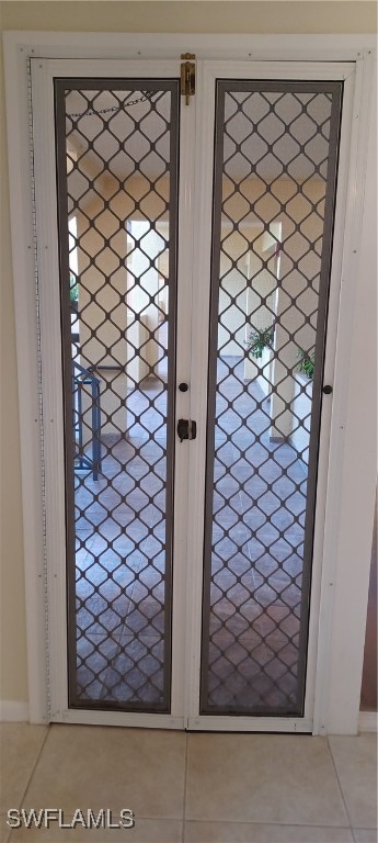 interior space featuring tile patterned flooring