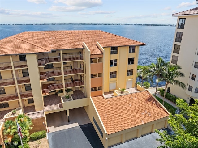 view of building exterior with a water view