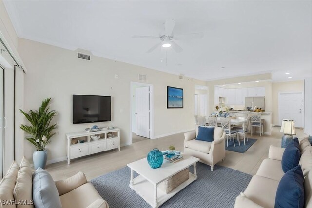 living room featuring ceiling fan