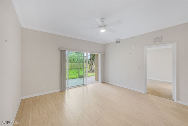 empty room with ceiling fan and ornamental molding