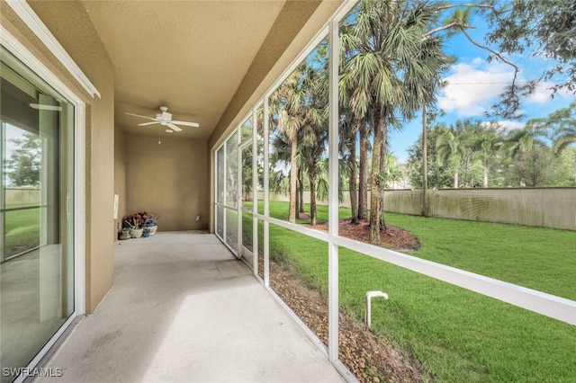 view of patio featuring ceiling fan