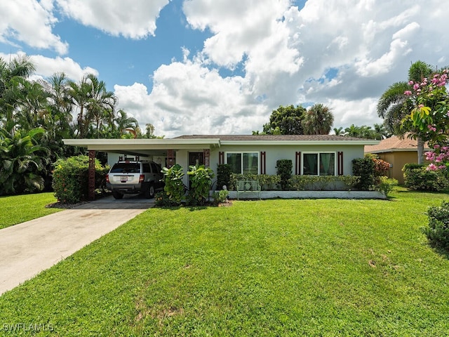 single story home with a carport and a front lawn