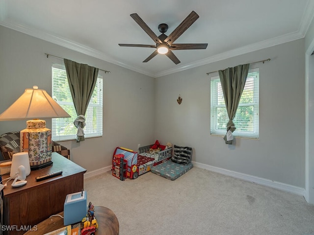 carpeted bedroom with crown molding, ceiling fan, and multiple windows