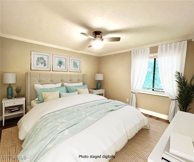 bedroom featuring ceiling fan, a textured ceiling, crown molding, and hardwood / wood-style floors