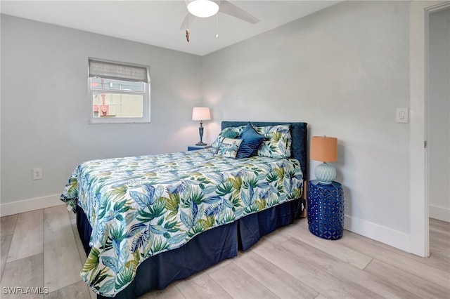 bedroom featuring light hardwood / wood-style flooring and ceiling fan