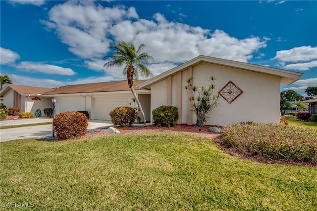 single story home featuring a front yard and a garage