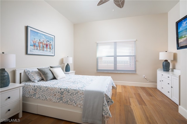 bedroom featuring light hardwood / wood-style floors and ceiling fan