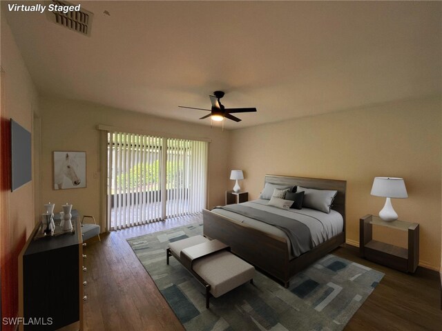 bedroom featuring dark hardwood / wood-style flooring, access to exterior, and ceiling fan