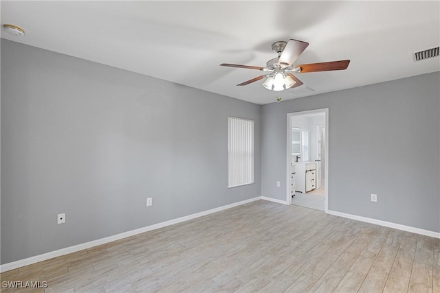 unfurnished room featuring ceiling fan and light hardwood / wood-style flooring