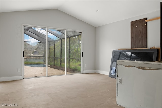 interior space with lofted ceiling and a healthy amount of sunlight