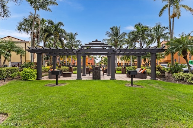 view of home's community with a lawn and a pergola