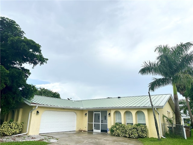 view of front of home featuring a garage