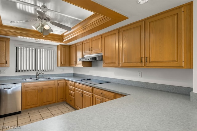 kitchen featuring ornamental molding, dishwasher, sink, ceiling fan, and a raised ceiling