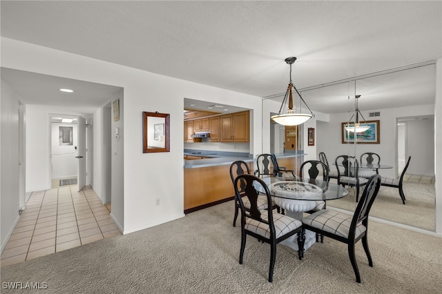 view of carpeted dining room