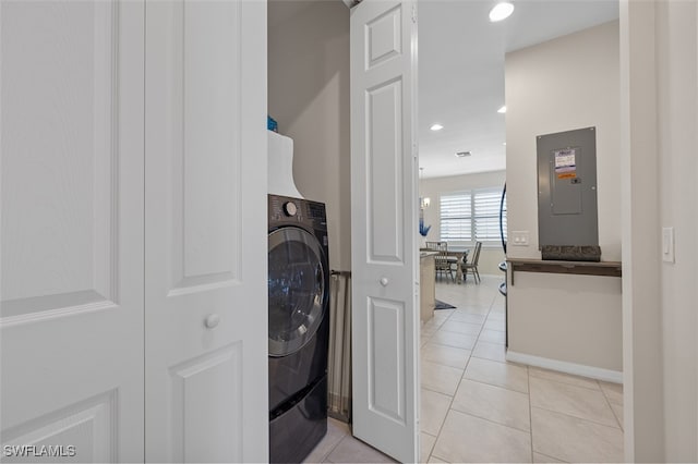 washroom with electric panel and light tile patterned flooring