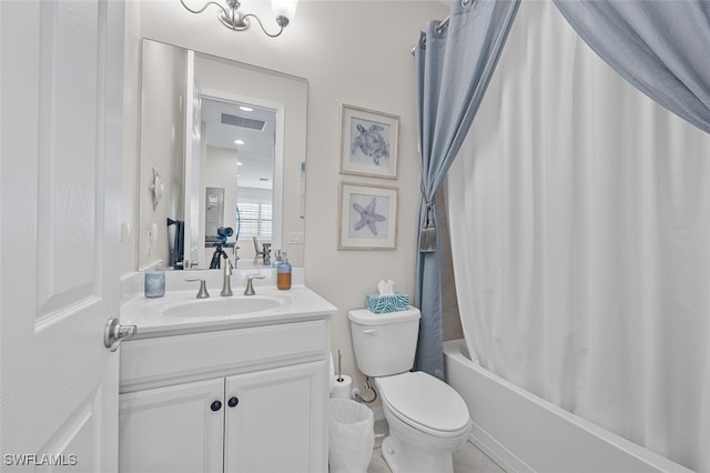 full bathroom featuring vanity, toilet, and shower / tub combo