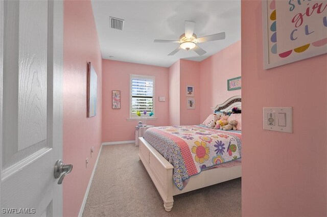 carpeted bedroom with ceiling fan