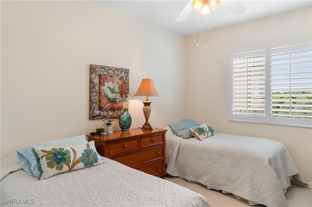 bedroom with carpet flooring and ceiling fan