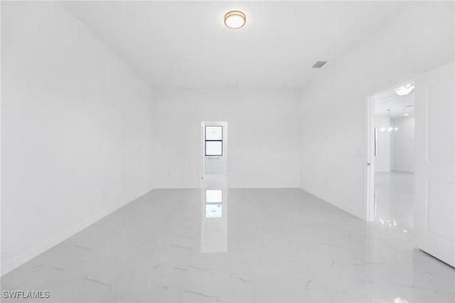 2602 73rd St W, Lehigh Acres, FL 33971 - unfurnished room with marble finish floor
