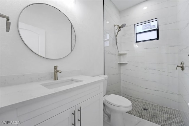 2602 73rd St W, Lehigh Acres, FL 33971 - full bath featuring toilet, vanity, and a marble finish shower
