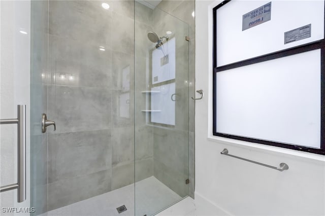 bathroom featuring walk in shower