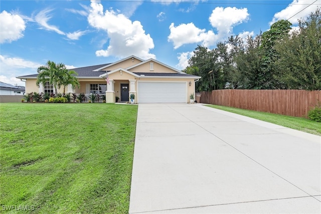 view of front of home featuring a garage and a front lawn