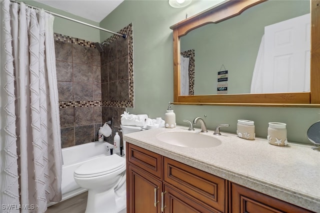 full bathroom with shower / bath combination with curtain, vanity, and toilet