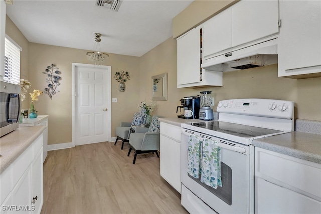 kitchen with decorative light fixtures, white electric range, light wood-type flooring, and white cabinetry