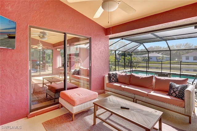 sunroom with a wealth of natural light, a swimming pool, and vaulted ceiling