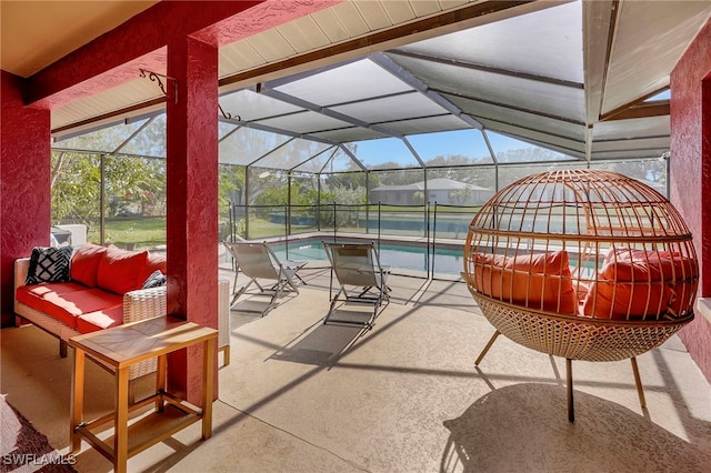 view of patio / terrace with outdoor lounge area and a lanai