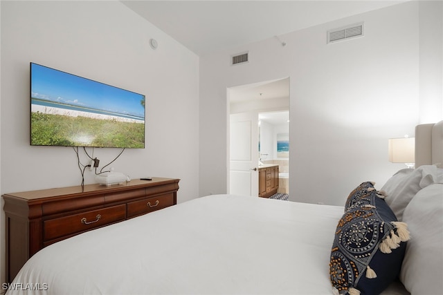 bedroom featuring connected bathroom