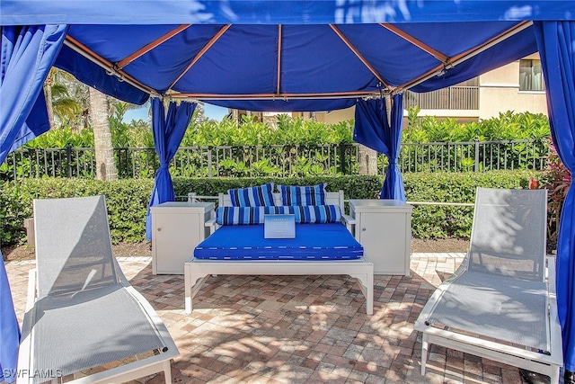 view of patio / terrace with an outdoor hangout area and a gazebo