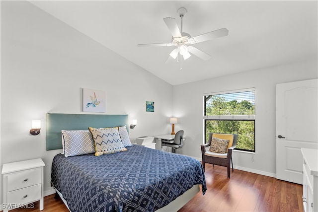 bedroom featuring vaulted ceiling, ceiling fan, and dark wood-type flooring