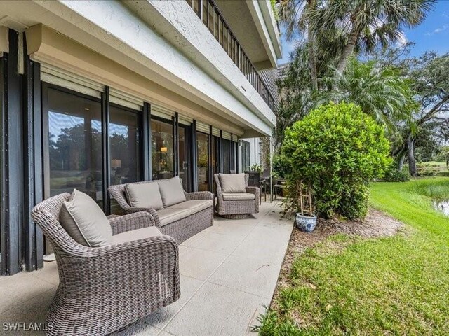 view of patio / terrace featuring an outdoor hangout area and a balcony