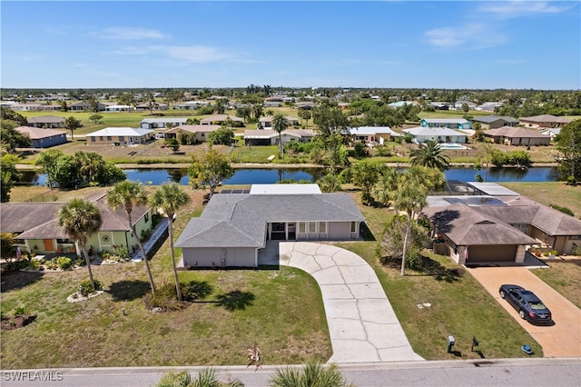 drone / aerial view featuring a water view