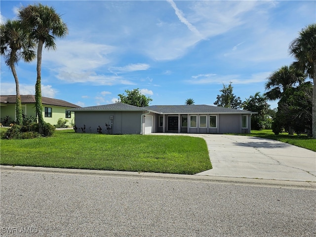 single story home with a front yard