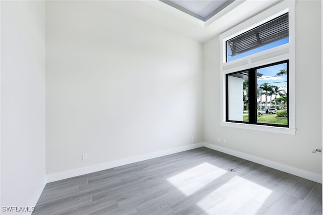 spare room featuring hardwood / wood-style floors