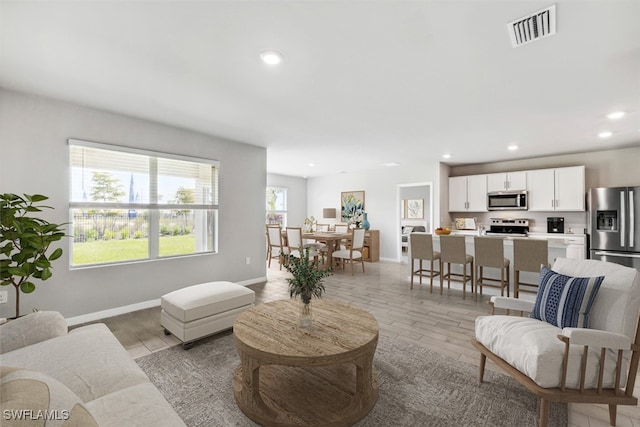 living room with light wood-type flooring