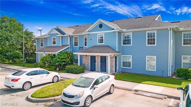 view of property with a front yard